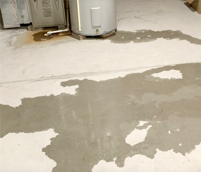 puddles of water on a basement floor