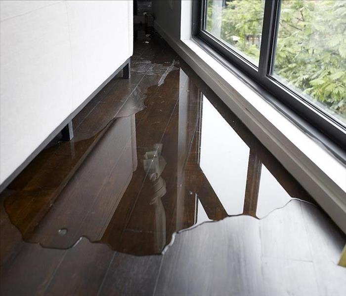 Wood floor covered with water